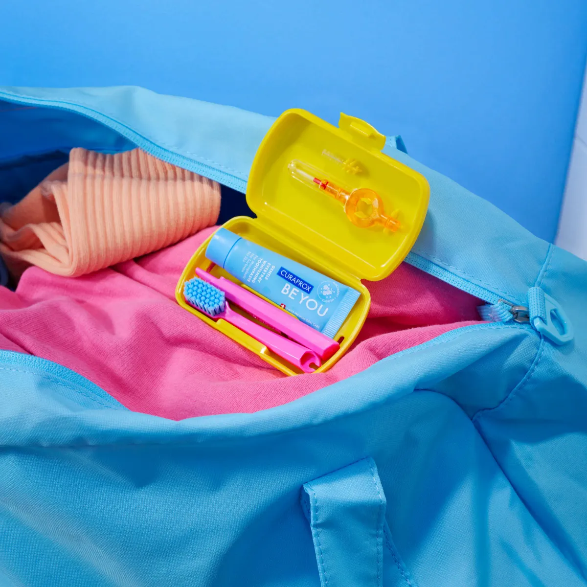 Open travel set in bag