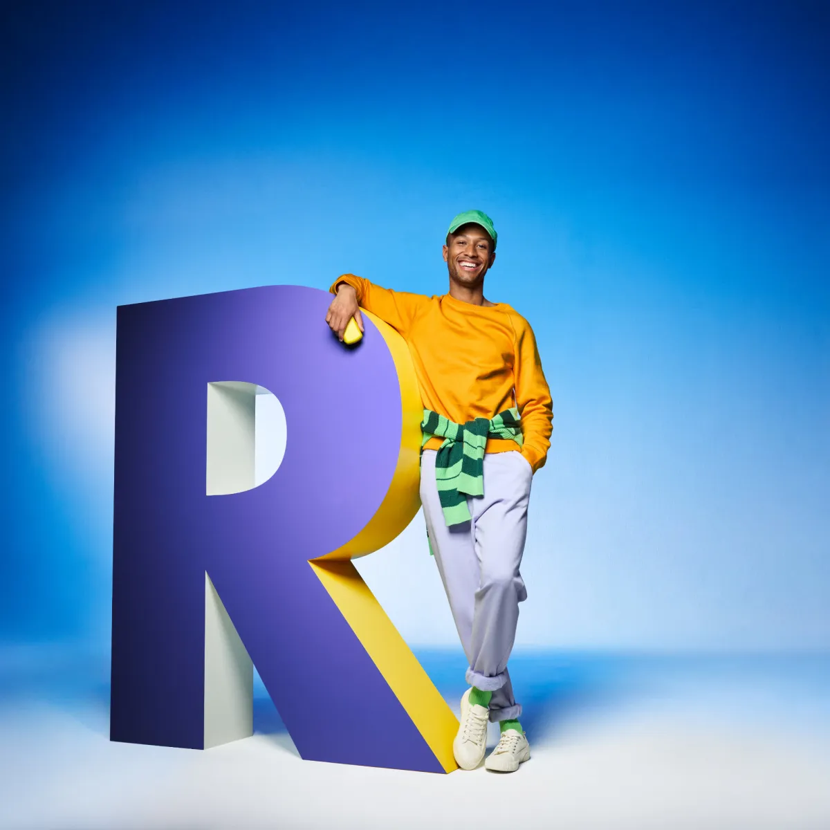 Smiling man holding travel set